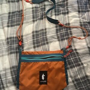 Cotopaxi Vibrant Orange and Teal Messenger Bag